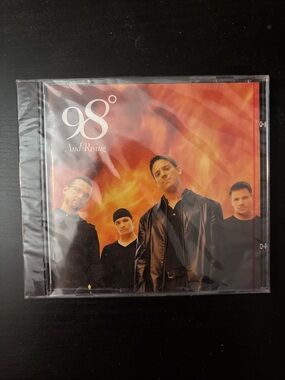 — And Rising (Red / Orange Cover)